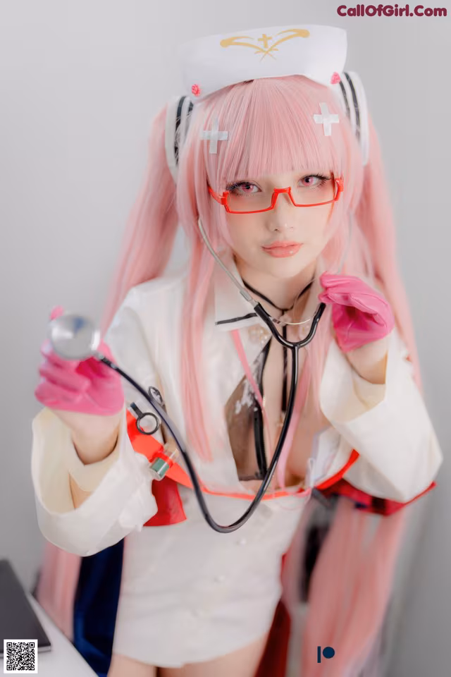 A woman dressed as a nurse holding a stethoscope.